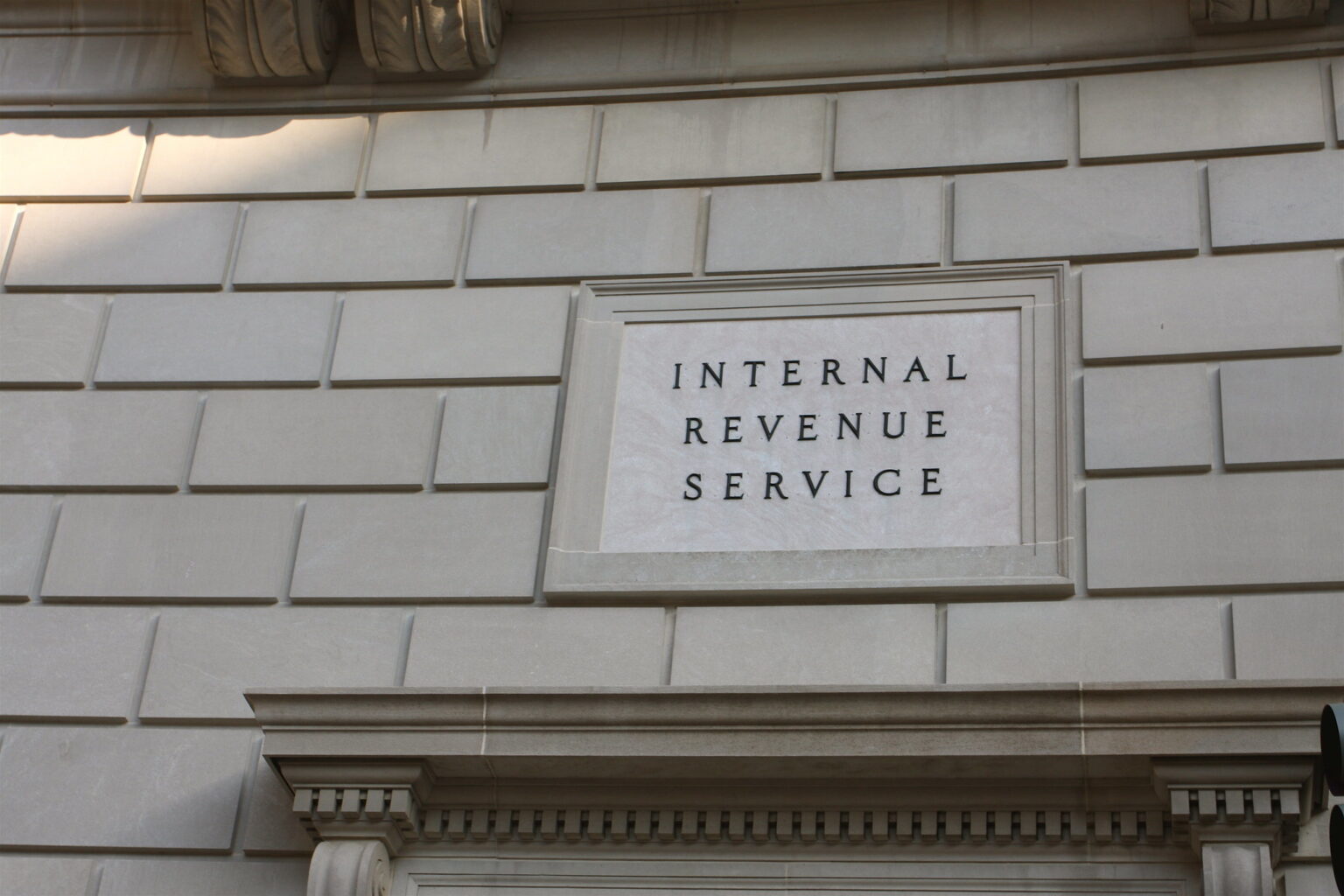 sign on the front of an Internal Revenue Service Building