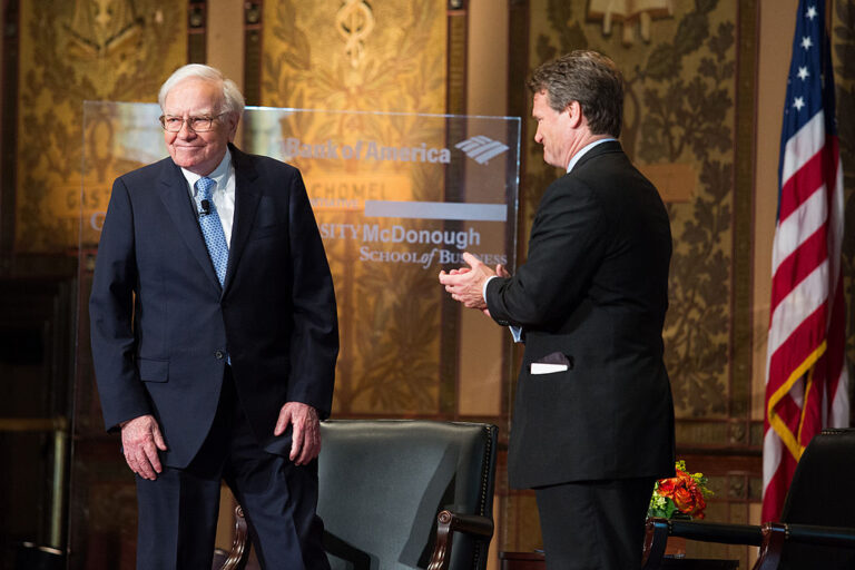 WASHINGTON, DC - SEPTEMBER 19: Warren Buffett (L), chairman of the board and CEO of Berkshire Hathaway, is introduced with Bank of America CEO Brian Moynihan, before speaking in Gaston Hall at Georgetown University, September 19, 2013 in Washington, DC. Buffett also took questions from Georgetown students.