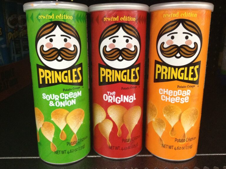 Cans of Kellanova snack brand Pringles cans on a store shelf