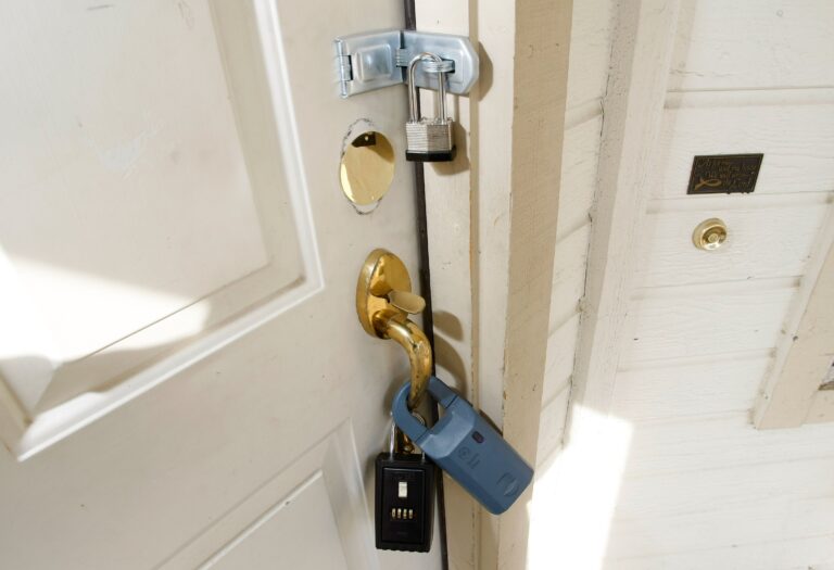 ANTIOCH, CA - OCTOBER 15: A padlock and real estate agent key lock boxes are seen on the front door of a foreclosed home October15, 2007 in Antioch, California. The San Francisco Bay Area zip code 94531, Antioch, California, has experienced a spike in home foreclosures with a reported 271 homes repossessed between January and August of this year. Antioch has also seen the biggest decline in home prices since May of this year with prices dropping 15 percent. California ranks third behind Ohio and Michigan in foreclosures.