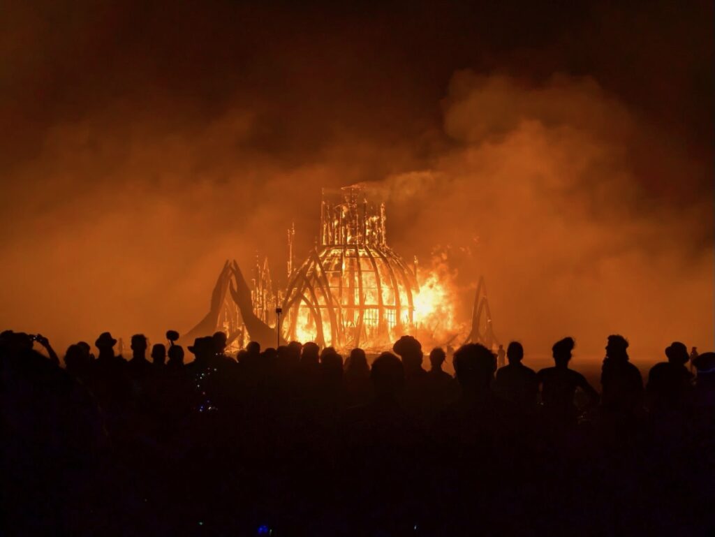 art installation on fire at burning man festival 2024 in black rock city, nevada