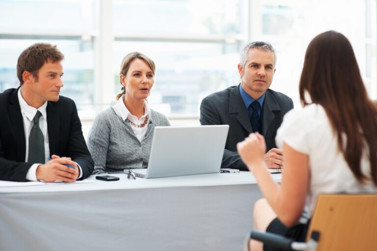 Woman in a panel interview during a marathon interviews process