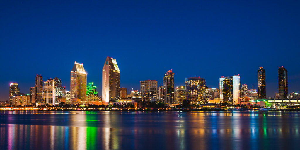 night time view of san diego skyline on waterfront