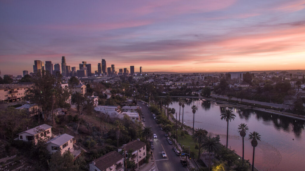 Echo park lake with downtown los angeles skyline at sunset