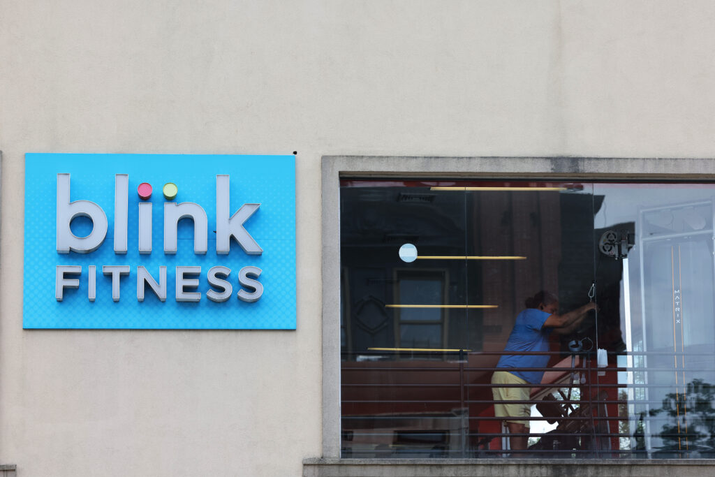 NEW YORK, NEW YORK - AUGUST 12: A Blink Fitness gym is seen on Flatbush Avenue on August 12, 2024 in the Flatbush neighborhood of the Brooklyn borough in New York City. Blink Fitness, an affordable gym operator that is owned by Equinox, has filed for Chapter 11 bankruptcy protection. The fitness chain, which has more than 100 locations, has stated that its gyms will remain open as it goes through the bankruptcy process.  