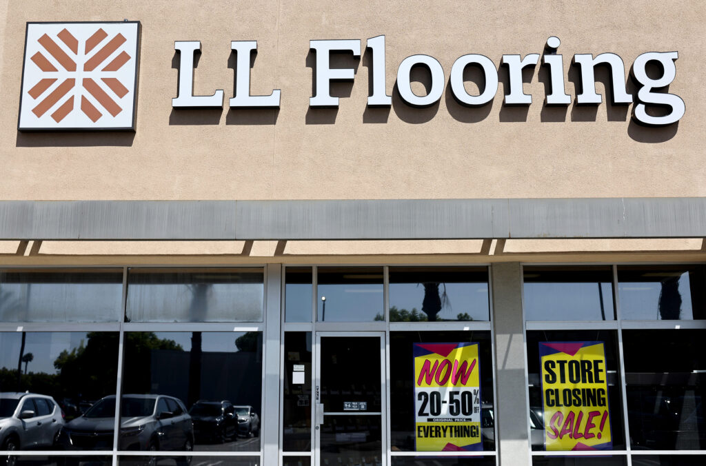 TORRANCE, CALIFORNIA - AUGUST 12: The LL Flooring logo is displayed at one of the LL Flooring retail locations which will close on August 12, 2024 in Torrance, California. The specialty flooring company, formerly called Lumber Liquidators, filed for Chapter 11 bankruptcy yesterday and is closing 94 locations across the U.S.