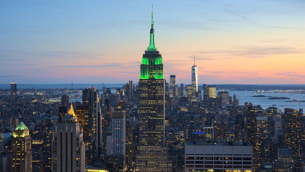 drone shot of NYC at dusk