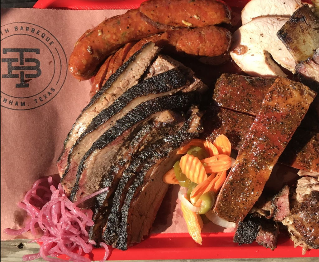 A tray of smoked meat BBQ at Truth Barbecue in Brenham, Texas