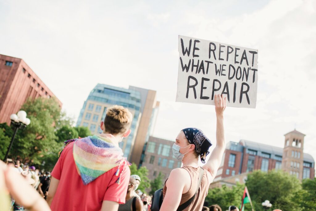 protester from a Black Lives Matter march holding up a sign.