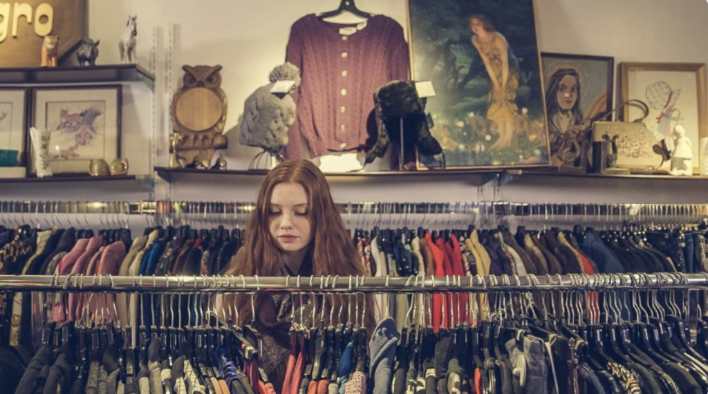 girl shopping at a thrift store